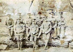 Peter Pieraccini 2nd from rightsitting on log. Bedfordshire Regiment