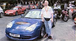 Kevin Jarman in Rome pictured beside the Porsche GT3
