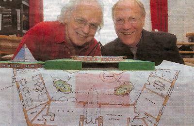 Clive Bevins, right, and Ray Wilson with blueprints for a holistic healing centre in Bedfordshire.